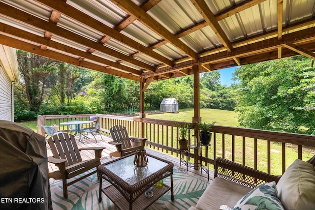 12903 Georgetown Village Ln, Georgetown, TN 37336 - wooden terrace featuring a yard, outdoor dining space, a grill, and view of scattered trees