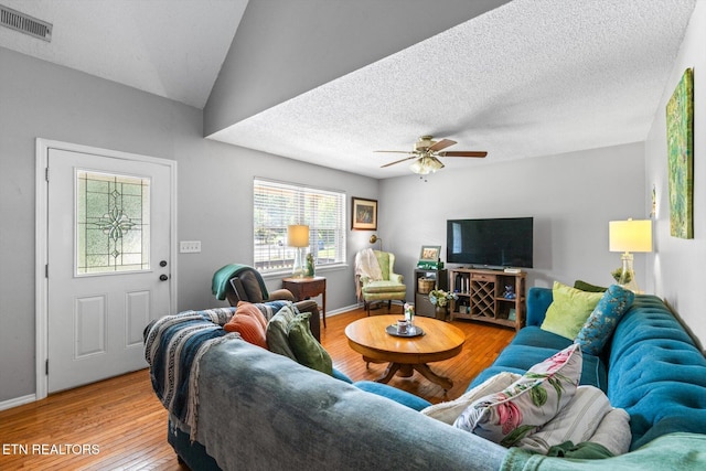12903 Georgetown Village Ln, Georgetown, TN 37336 - living room with wood finished floors, a ceiling fan, a textured ceiling, and baseboards
