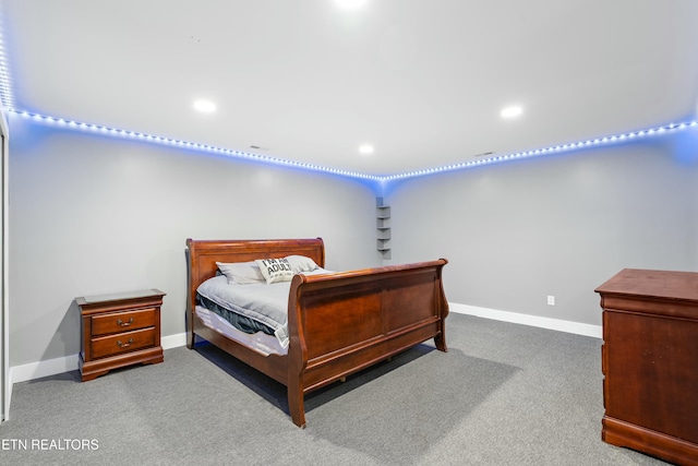 carpeted bedroom with baseboards and recessed lighting