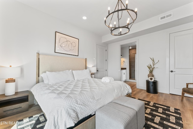 896 Chalet Village Blvd, Gatlinburg, TN 37738 - bedroom with a chandelier, recessed lighting, visible vents, and wood finished floors