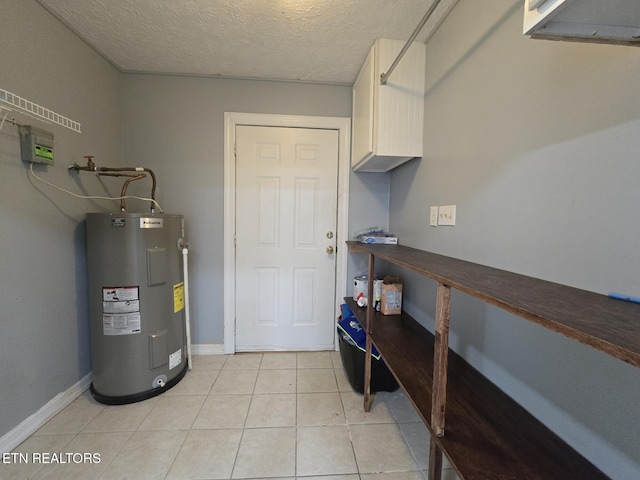 utility room featuring water heater