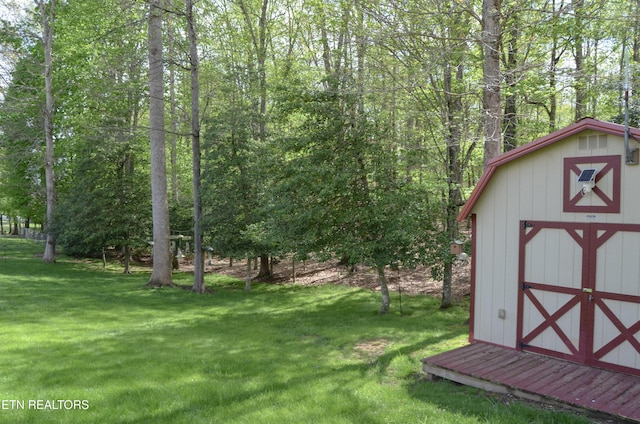 76 Sundrop Ln, Crossville, TN 38571 - view of grassy yard with a storage shed