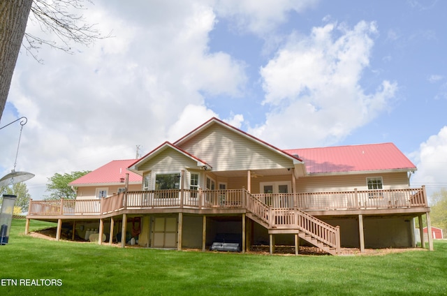 76 Sundrop Ln, Crossville, TN 38571 - rear view of house with a deck, stairway, a lawn, and a metal roof