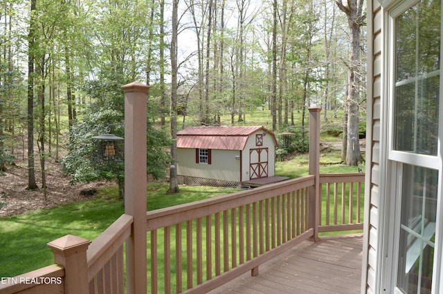 76 Sundrop Ln, Crossville, TN 38571 - wooden terrace with a storage unit and a lawn