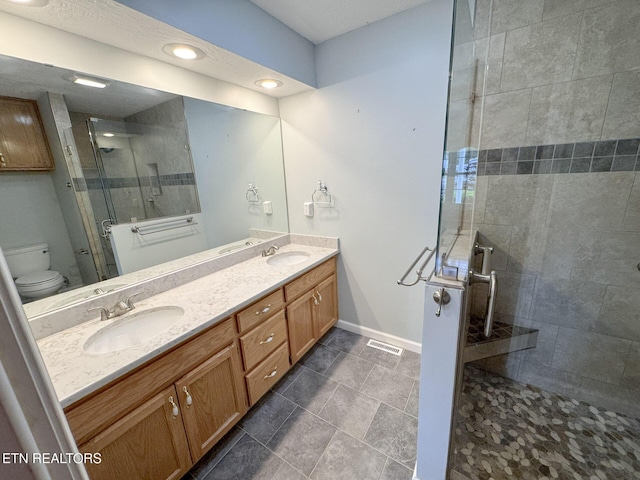 76 Sundrop Ln, Crossville, TN 38571 - full bathroom with a stall shower, double vanity, and recessed lighting