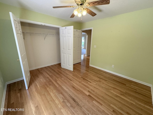 76 Sundrop Ln, Crossville, TN 38571 - unfurnished bedroom featuring light wood-style floors, a closet, and a ceiling fan