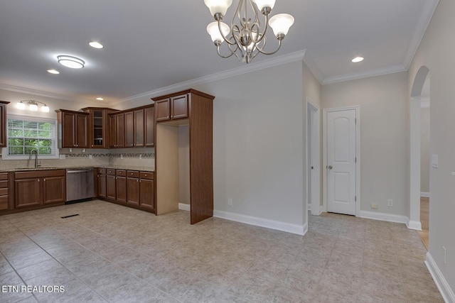 100 Coyatee Cir, Loudon, TN 37774 - kitchen featuring glass insert cabinets, a sink, crown molding, arched walkways, and dishwasher