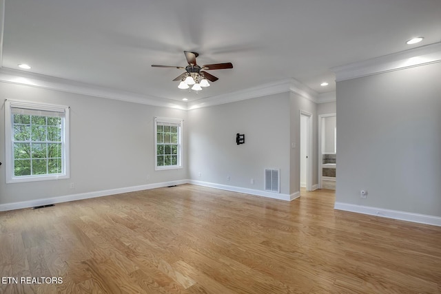 100 Coyatee Cir, Loudon, TN 37774 - unfurnished room featuring ornamental molding, a ceiling fan, visible vents, and light wood-style flooring