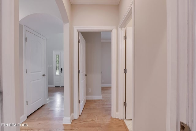 100 Coyatee Cir, Loudon, TN 37774 - hallway with light wood-type flooring, baseboards, and arched walkways