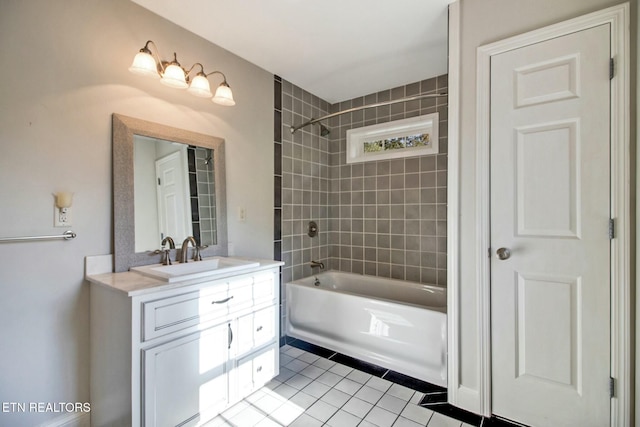 bathroom featuring vanity, tile patterned floors, and shower / bath combination