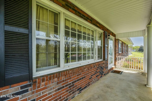 view of patio featuring a porch