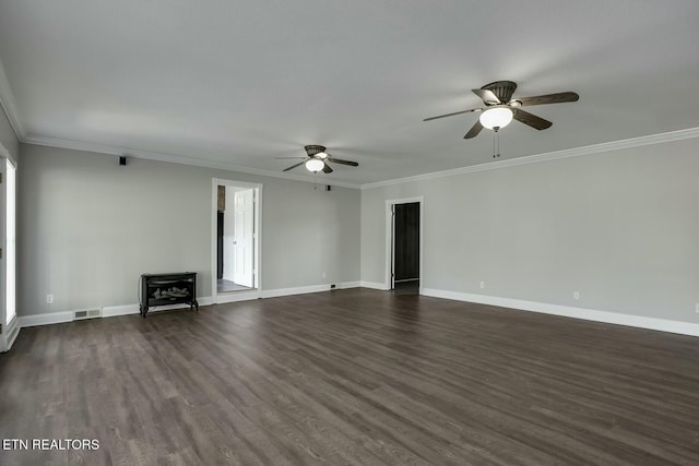unfurnished living room with a ceiling fan, visible vents, dark wood-style floors, and crown molding
