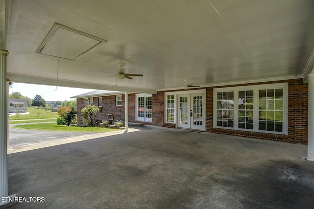 view of patio / terrace featuring a ceiling fan and french doors