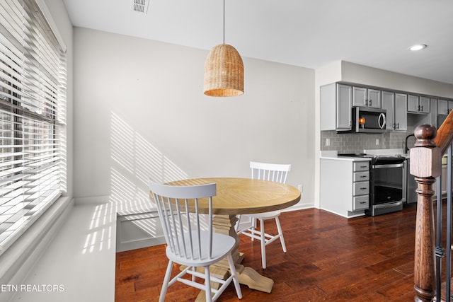 8411 Ivy Green Way, Knoxville, TN 37919 - dining area with a wealth of natural light, dark wood-style floors, and visible vents
