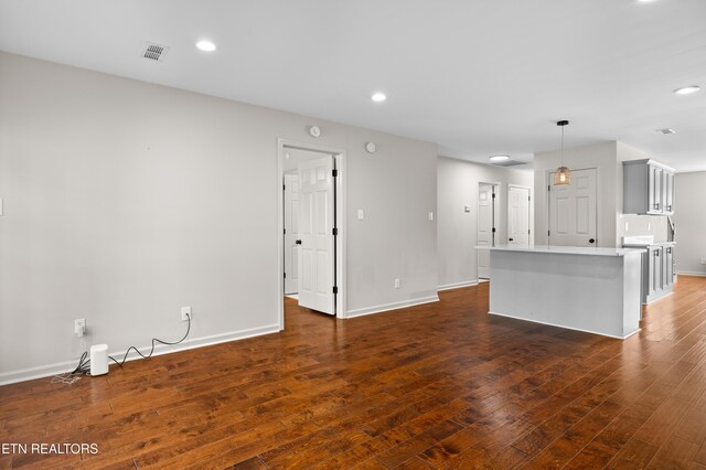 8411 Ivy Green Way, Knoxville, TN 37919 - unfurnished living room featuring recessed lighting, dark wood finished floors, visible vents, and baseboards