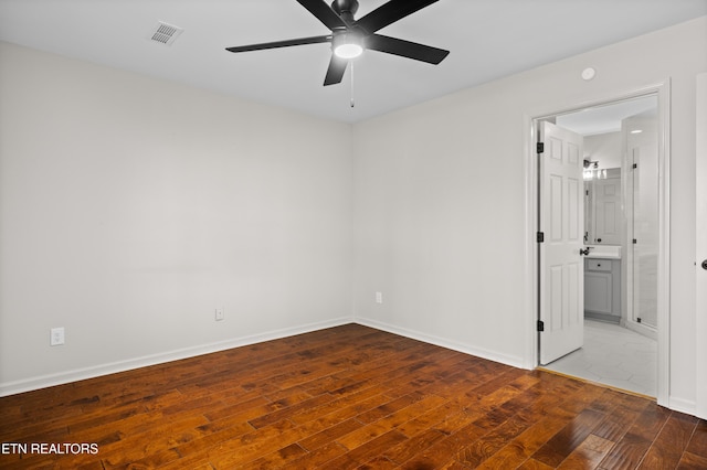 8411 Ivy Green Way, Knoxville, TN 37919 - unfurnished bedroom featuring baseboards, ensuite bathroom, visible vents, and wood-type flooring