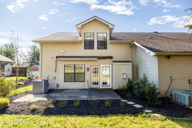 8411 Ivy Green Way, Knoxville, TN 37919 - rear view of house with roof with shingles, central AC, and a patio