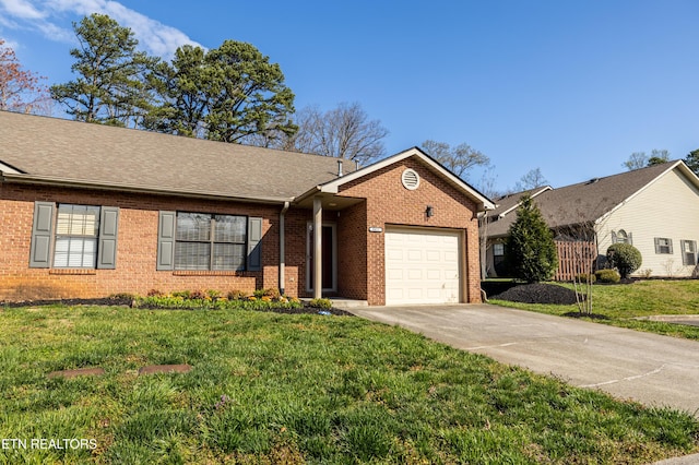 8411 Ivy Green Way, Knoxville, TN 37919 - single story home featuring a front lawn, brick siding, driveway, and a garage