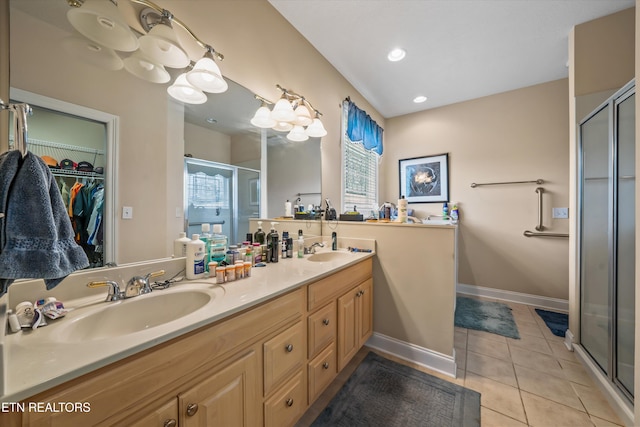 1079 Rarity Bay Pkwy, Vonore, TN 37885 - bathroom with tile patterned flooring, a stall shower, and a sink