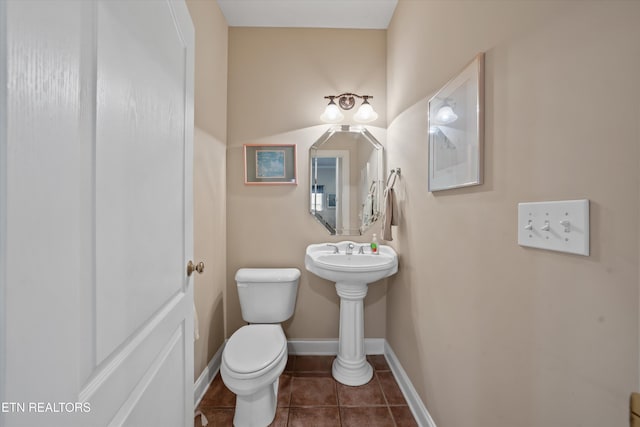 1079 Rarity Bay Pkwy, Vonore, TN 37885 - half bath featuring toilet, tile patterned floors, and baseboards