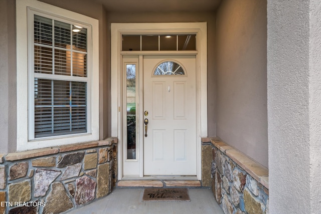 1079 Rarity Bay Pkwy, Vonore, TN 37885 - property entrance featuring covered porch and stucco siding