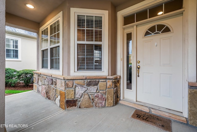 1079 Rarity Bay Pkwy, Vonore, TN 37885 - doorway to property with a porch and stone siding