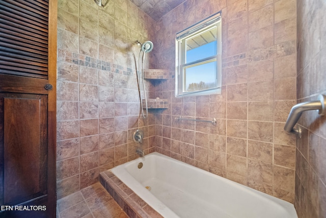 full bathroom featuring tiled shower / bath