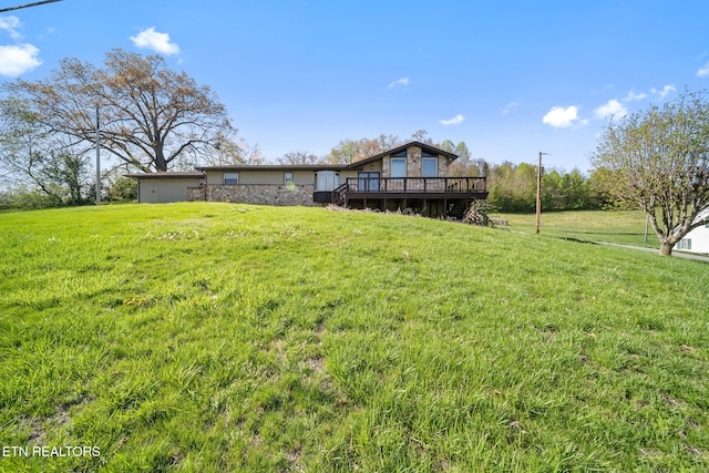 view of yard with a deck