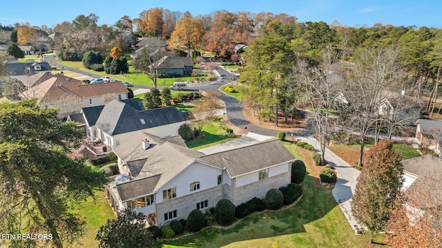 drone / aerial view with a residential view