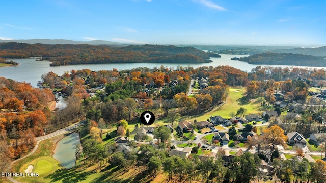 bird's eye view with a water view and a residential view