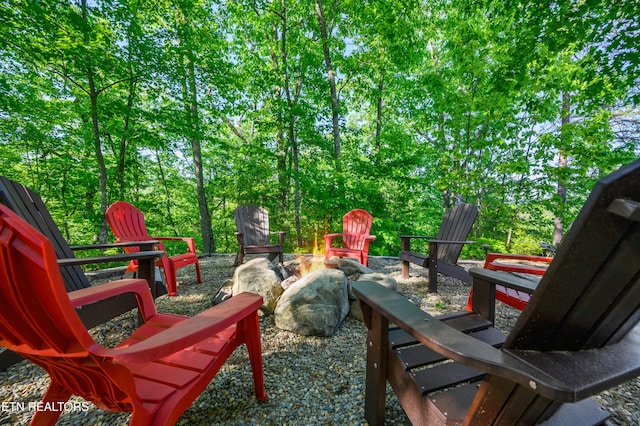 view of patio featuring an outdoor fire pit