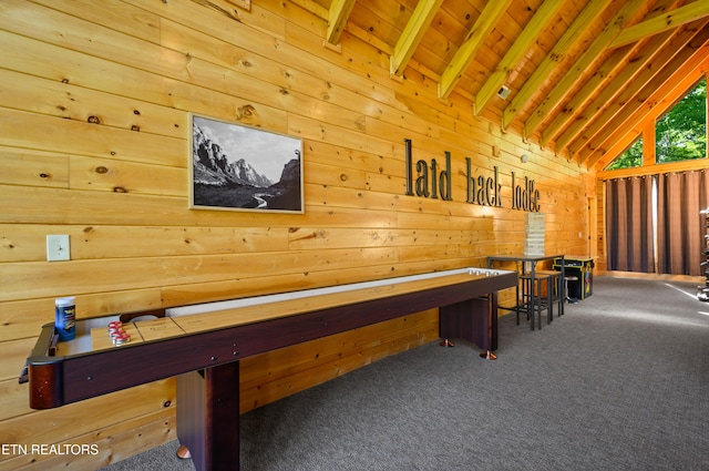 game room featuring wood ceiling, vaulted ceiling with beams, wood walls, and carpet floors