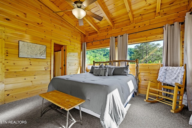 carpeted bedroom featuring lofted ceiling with beams, wooden ceiling, and wooden walls