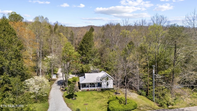 bird's eye view featuring a view of trees
