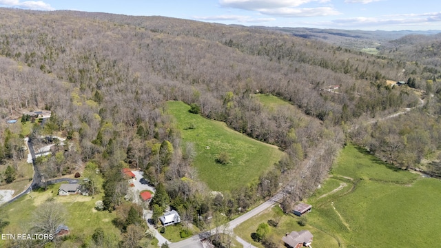 drone / aerial view with a forest view