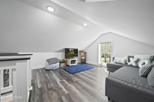 living area featuring recessed lighting, wood finished floors, lofted ceiling, and baseboards