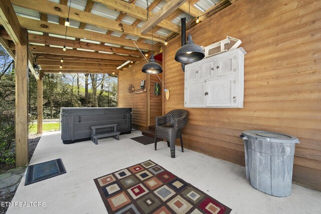 view of patio / terrace featuring a hot tub