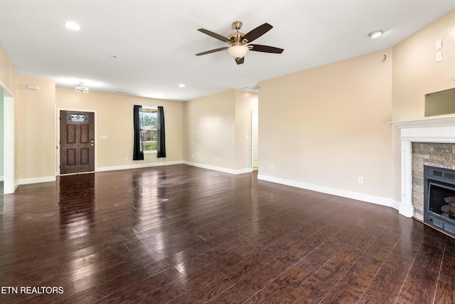 283 Red Hill Rd, Andersonville, TN 37705 - unfurnished living room featuring ceiling fan, a fireplace, wood finished floors, baseboards, and recessed lighting