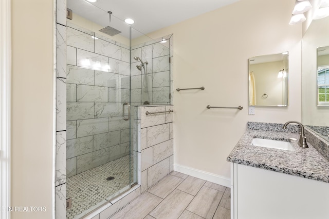 283 Red Hill Rd, Andersonville, TN 37705 - full bathroom with a stall shower, vanity, baseboards, and recessed lighting