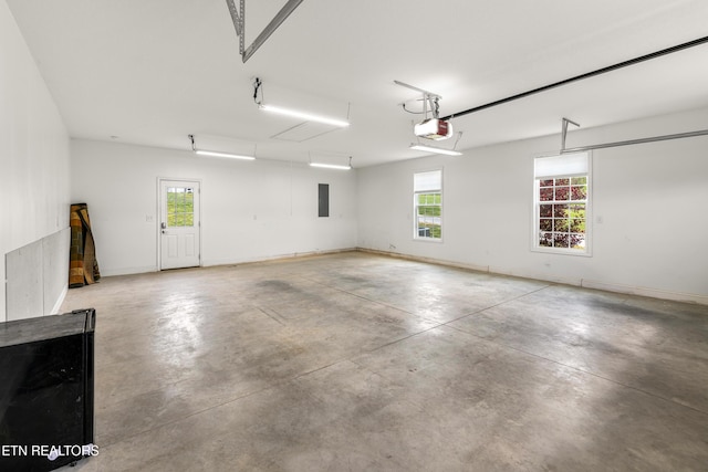 283 Red Hill Rd, Andersonville, TN 37705 - garage with a garage door opener and baseboards