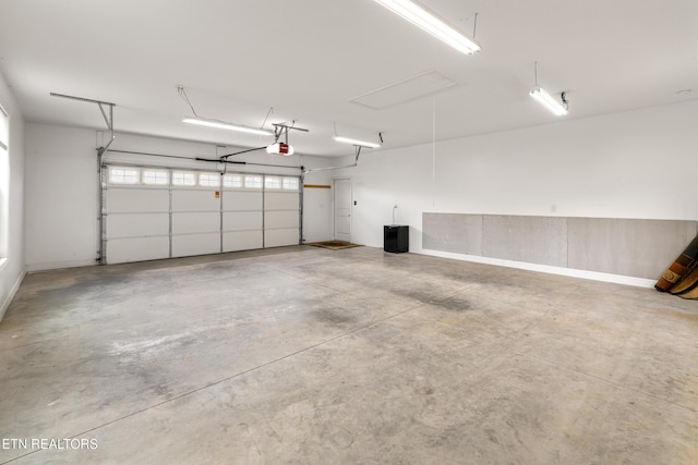 283 Red Hill Rd, Andersonville, TN 37705 - garage with a garage door opener and baseboards