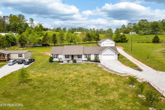 283 Red Hill Rd, Andersonville, TN 37705 - view of front of property featuring driveway, an attached garage, a front yard, and view of wooded area