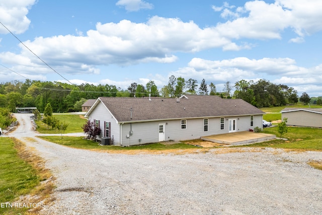 283 Red Hill Rd, Andersonville, TN 37705 - rear view of house featuring a deck, cooling unit, driveway, and a shingled roof