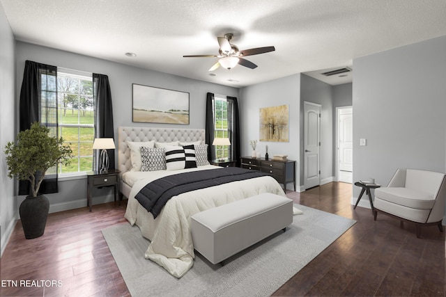 283 Red Hill Rd, Andersonville, TN 37705 - bedroom with baseboards, multiple windows, wood finished floors, and a ceiling fan