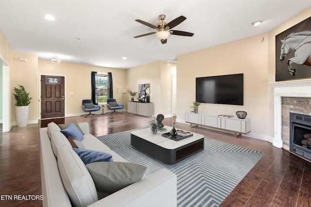 283 Red Hill Rd, Andersonville, TN 37705 - living room featuring a ceiling fan, a fireplace, wood finished floors, baseboards, and recessed lighting