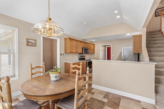 dining area featuring stairs, a chandelier, baseboards, lofted ceiling, and recessed lighting