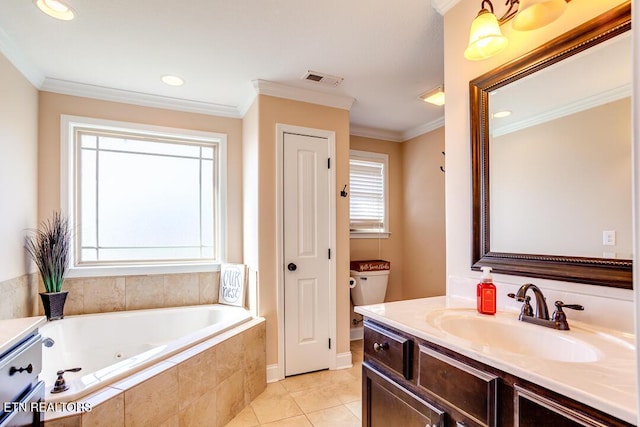 bathroom with a jetted tub, visible vents, vanity, and ornamental molding