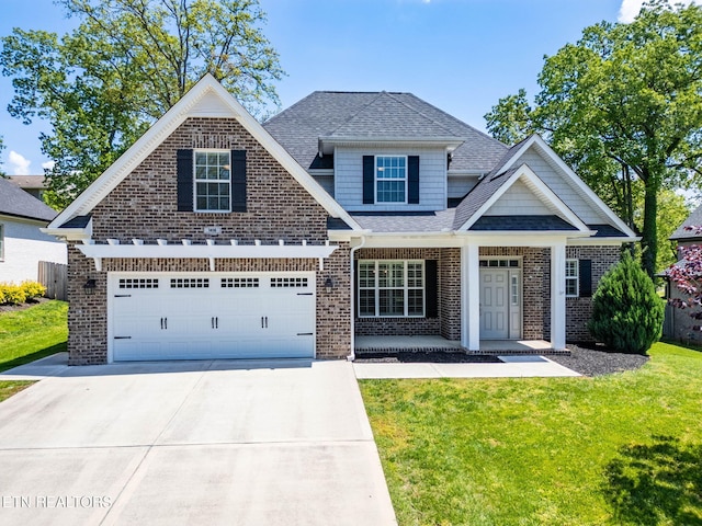 1416 Ebenezer Rd, Knoxville, TN 37922 - craftsman-style home featuring brick siding, a shingled roof, a front lawn, and concrete driveway