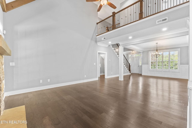 1416 Ebenezer Rd, Knoxville, TN 37922 - unfurnished living room with stairway, ornamental molding, ceiling fan with notable chandelier, and wood finished floors