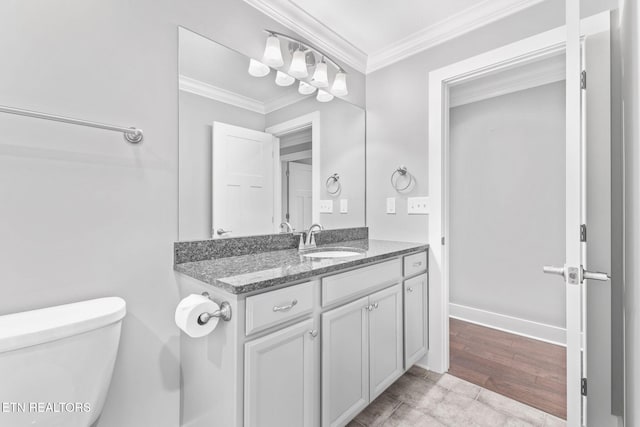 1416 Ebenezer Rd, Knoxville, TN 37922 - half bath featuring vanity, ornamental molding, baseboards, and toilet